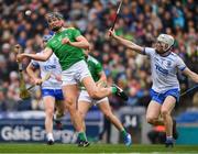 31 March 2019; Gearóid Hegarty of Limerick scores a late point under pressure from Shane McNulty of Waterford during the Allianz Hurling League Division 1 Final match between Limerick and Waterford at Croke Park in Dublin. Photo by Ray McManus/Sportsfile