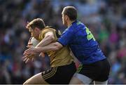 31 March 2019; James O'Donoghue of Kerry is tackled by Keith Higgins of Mayo during the Allianz Football League Division 1 Final match between Kerry and Mayo at Croke Park in Dublin. Photo by Ray McManus/Sportsfile