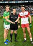 30 March 2019; Referee Brendan Cawley with the Leitrim captain, Micheal McWeeney, and the Derry captain, Christopher McKaigue, before the Allianz Football League Division 4 Final between Derry and Leitrim at Croke Park in Dublin. Photo by Ray McManus/Sportsfile