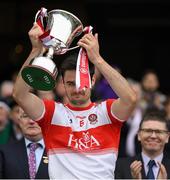 30 March 2019; Christopher McKaigue of Derry lifts the cup after the Allianz Football League Division 4 Final between Derry and Leitrim at Croke Park in Dublin. Photo by Ray McManus/Sportsfile