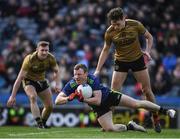 31 March 2019; Chris Barrett of Mayo is tackled by David Clifford of Kerry as he prepares to clear late in the Allianz Football League Division 1 Final match between Kerry and Mayo at Croke Park in Dublin. Photo by Ray McManus/Sportsfile