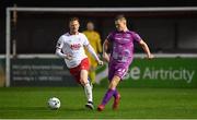 1 April 2019; Daniel Cleary of Dundalk in action against Gary Shaw of St Patrick's Athletic during the EA Sports Cup Second Round match between St. Patrick’s Athletic and Dundalk at Richmond Park in Dublin. Photo by Seb Daly/Sportsfile