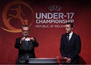 4 April 2019; Tournament ambassador John O'Shea, right, and UEFA Head of National Team Competitions Lance Kelly pulls the name of Russia during the 2019 UEFA European Under-17 Championship Finals Draw at the Aviva Stadium in Dublin. Photo by Stephen McCarthy/Sportsfile