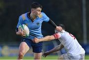 4 April 2019; David Ryan of UCD is tackled by Rowan Osborne of Trinity during the Annual Men's Colours match between UCD and Trinity at the UCD Bowl in Belfield, Dublin. Photo by Matt Browne/Sportsfile