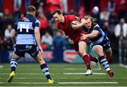 5 April 2019; Darren Sweetnam of Munster is tackled by Kristian Dacey of Cardiff Blues during the Guinness PRO14 Round 19 match between Munster and Cardiff Blues at Irish Independent Park in Cork. Photo by Ramsey Cardy/Sportsfile