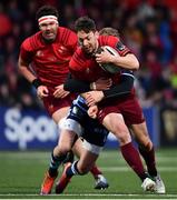 5 April 2019; Darren Sweetnam of Munster is tackled by Gareth Anscombe of Cardiff Blues during the Guinness PRO14 Round 19 match between Munster and Cardiff Blues at Irish Independent Park in Cork. Photo by Ramsey Cardy/Sportsfile