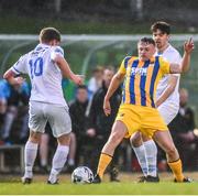 5 April 2019; Jonathan Lunney of Waterford in action against Timmy Molloy of UCD during the SSE Airtricity League Premier Division match between UCD and Waterford at The UCD Bowl in Belfield, Dublin. Photo by Ben McShane/Sportsfile