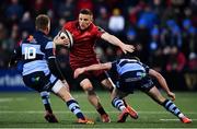 5 April 2019; Andrew Conway of Munster in action against Gareth Anscombe, left, and Tomos Williams of Cardiff Blues during the Guinness PRO14 Round 19 match between Munster and Cardiff Blues at Irish Independent Park in Cork. Photo by Ramsey Cardy/Sportsfile