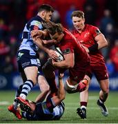 5 April 2019; Arno Botha of Munster is tackled by Tomos Williams of Cardiff Blues during the Guinness PRO14 Round 19 match between Munster and Cardiff Blues at Irish Independent Park in Cork. Photo by Ramsey Cardy/Sportsfile