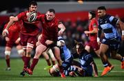 5 April 2019; Dave Kilcoyne of Munster is tackled by Rey Lee-Lo of Cardiff Blues during the Guinness PRO14 Round 19 match between Munster and Cardiff Blues at Irish Independent Park in Cork. Photo by Ramsey Cardy/Sportsfile