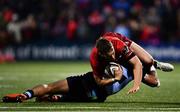 5 April 2019; Darren Sweetnam of Munster is tackled by Aled Summerhill of Cardiff Blues during the Guinness PRO14 Round 19 match between Munster and Cardiff Blues at Irish Independent Park in Cork. Photo by Ramsey Cardy/Sportsfile