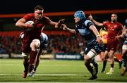 5 April 2019; CJ Stander of Munster gets away from Olly Robinson of Cardiff Blues on his way to scoring his side's third try during the Guinness PRO14 Round 19 match between Munster and Cardiff Blues at Irish Independent Park in Cork. Photo by Diarmuid Greene/Sportsfile