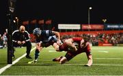 5 April 2019; Andrew Conway of Munster scores his side's fifth try despite the efforts of Matthew Morgan of Cardiff Blues during the Guinness PRO14 Round 19 match between Munster and Cardiff Blues at Irish Independent Park in Cork. Photo by Diarmuid Greene/Sportsfile