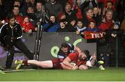 5 April 2019; Sammy Arnold of Munster scores his side's sixth try despite the efforts of Owen Lane of Cardiff Blues during the Guinness PRO14 Round 19 match between Munster and Cardiff Blues at Irish Independent Park in Cork. Photo by Diarmuid Greene/Sportsfile