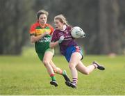 6 April 2019; Brenda Naughton of Coláiste Bhaile Chláir, Claregalway, in action against Emily Druse of St Catherine's, Armagh, during the Lidl All Ireland Post Primary School Junior A Final match between Coláiste Bhaile Chláir, Claregalway, Galway, and St Catherine’s, Armagh, at Philly McGuinness Memorial Park in Mohill in Co Leitrim. Photo by Stephen McCarthy/Sportsfile
