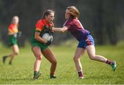 6 April 2019; Caitlin McCormick of St Catherine's, Armagh, in action against Éabha Brennan of Coláiste Bhaile Chláir, Claregalway, during the Lidl All Ireland Post Primary School Junior A Final match between Coláiste Bhaile Chláir, Claregalway, Galway, and St Catherine’s, Armagh, at Philly McGuinness Memorial Park in Mohill in Co Leitrim. Photo by Stephen McCarthy/Sportsfile