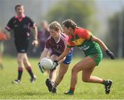 6 April 2019; Brenda Naughton of Coláiste Bhaile Chláir, Claregalway, in action against Caitlin McCormick of St Catherine's, Armagh, during the Lidl All Ireland Post Primary School Junior A Final match between Coláiste Bhaile Chláir, Claregalway, Galway, and St Catherine’s, Armagh, at Philly McGuinness Memorial Park in Mohill in Co Leitrim. Photo by Stephen McCarthy/Sportsfile