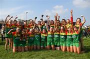 6 April 2019; St Catherine's, Armagh, players celebrate with the cup following the Lidl All Ireland Post Primary School Junior A Final match between Coláiste Bhaile Chláir, Claregalway, Galway, and St Catherine’s, Armagh, at Philly McGuinness Memorial Park in Mohill in Co Leitrim. Photo by Stephen McCarthy/Sportsfile