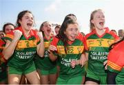 6 April 2019; St Catherine's, Armagh, players, from left, Emily Druse, Fiadhna Hughes and Aoife Boyle celebrate following the Lidl All Ireland Post Primary School Junior A Final match between Coláiste Bhaile Chláir, Claregalway, Galway, and St Catherine’s, Armagh, at Philly McGuinness Memorial Park in Mohill in Co Leitrim. Photo by Stephen McCarthy/Sportsfile