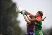 6 April 2019; Caitlin McCormick of St Catherine's, Armagh, in action against Brenda Naughton of Coláiste Bhaile Chláir, Claregalway, during the Lidl All Ireland Post Primary School Junior A Final match between Coláiste Bhaile Chláir, Claregalway, Galway, and St Catherine’s, Armagh, at Philly McGuinness Memorial Park in Mohill in Co Leitrim. Photo by Stephen McCarthy/Sportsfile