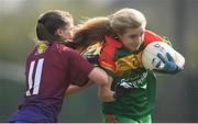 6 April 2019; Emma Conroy of St Catherine's, Armagh, in action against Laura Scanlon of Coláiste Bhaile Chláir, Claregalway, during the Lidl All Ireland Post Primary School Junior A Final match between Coláiste Bhaile Chláir, Claregalway, Galway, and St Catherine’s, Armagh, at Philly McGuinness Memorial Park in Mohill in Co Leitrim. Photo by Stephen McCarthy/Sportsfile