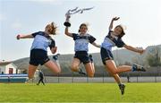 6 April 2019; Lucie Gilmartin, left, Grace Moloney, centre, and Ella O'Dwyer celebrate with the cup after the Lidl All Ireland Post Primary School Junior C Final match between Cashel Community School and FCJ Bunclody at St Molleran’s in Carrickbeg, Co. Waterford. Photo by Diarmuid Greene/Sportsfile