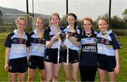 6 April 2019; Three sets of twins on the Cashel Community School team, from left, Lily and Annie Fahie, Rebecca and Leonie Farrell, and Caoilinn and Aoibheann Casey celebrate with the cup after the Lidl All Ireland Post Primary School Junior C Final match between Cashel Community School and FCJ Bunclody at St Molleran’s in Carrickbeg, Co. Waterford. Photo by Diarmuid Greene/Sportsfile