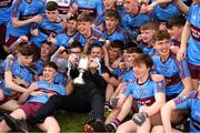 6 April 2019; The St Michaels College players, and the school principle Mark Henry, celebrate with the Hogan cup after the Masita GAA Post Primary Schools Hogan Cup Senior A Football match between Naas CBS and St Michaels College Enniskillen at Croke Park in Dublin. Photo by Ray McManus/Sportsfile
