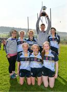 6 April 2019; Three sets of twins on the Cashel Community School team, Lily and Annie Fahie, Caoilinn and Aoibheann Casey, and Rebecca and Leonie Farrell celebrate with selector Nichola Gilmore and manager Richie Ryan after the Lidl All Ireland Post Primary School Junior C Final match between Cashel Community School and FCJ Bunclody at St Molleran’s in Carrickbeg, Co. Waterford. Photo by Diarmuid Greene/Sportsfile