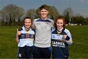 6 April 2019; Twins Aoibheann, left, and Caoilinn Casey of Cashel Community School, celebrate with manager Richie Ryan after the Lidl All Ireland Post Primary School Junior C Final match between Cashel Community School and FCJ Bunclody at St Molleran’s in Carrickbeg, Co. Waterford. Photo by Diarmuid Greene/Sportsfile
