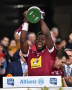 6 April 2019; Boidu Sayeh of Westmeath lifts the cup after the Allianz Football League Division 3 Final match between Laois and Westmeath at Croke Park in Dublin. Photo by Ray McManus/Sportsfile