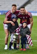 6 April 2019; Tommy McDaniel, left, and Noel Mulligan of Westmeath with five year old Tom and three year old Conor Adamson, from Moate, celebrate after the Allianz Football League Division 3 Final match between Laois and Westmeath at Croke Park in Dublin. Photo by Ray McManus/Sportsfile