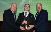 6 April 2019; Kieran Molloy of Corofin is presented with his Footballer of the Year award by Uachtarán Chumann Lúthchleas Gael John Horan, right, and Denis O'Callaghan, Head of AIB Retail Banking, at the AIB GAA Club Player 2018/19 Awards at Croke Park in Dublin. Photo by Stephen McCarthy/Sportsfile