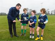 8 April 2019; Ard Stiúrthóir of the GAA Tom Ryan with members of St Colmcilles GAA Club, from left, Noah Noone Garland, age 9, Aisling Gillick, age 8, and Niall O'Donoghue, age 9, prior to the unveiling of the new GAA manifesto in both Irish and English at St Colmcilles GAA Club in Bettystown, Co Meath. The manifesto is an affirmation of the GAA's mission, vision and values, and a celebration of all the people who make the Association what it is. The intention is for the manifesto to be proudly displayed across the GAA network and wherever Gaelic Games are played at home and abroad&quot;. It marks the start of a wider support message that celebrates belonging to the GAA, which is centered around the statement: ‘GAA – Where We All Belong’ / CLG – Tá Áit Duinn Uilig’. Photo by Stephen McCarthy/Sportsfile