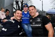 8 April 2019; 7 year old Fionn Duffy, from Waterford city, with Jack McGrath and Seán O'Brien during a signing session for Leinster Rugby season ticket holders at Energia Park in Donnybrook, Dublin. Photo by Ramsey Cardy/Sportsfile