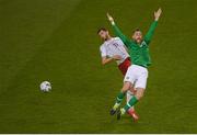 26 March 2019; Richard Keogh of Republic of Ireland is tackled by Giorgi Kvilitaia of Georgia during the UEFA EURO2020 Group D qualifying match between Republic of Ireland and Georgia at the Aviva Stadium, Lansdowne Road, in Dublin. Photo by Eóin Noonan/Sportsfile