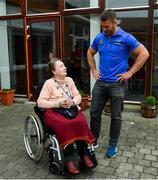 12 April 2019; MS Ireland are a charity partner of Leinster Rugby and as part of their partnership they will have a match day take-over at the RDS Arena tomorrow. Ahead of the game Leo Cullen and Seán O’Brien visited staff and patients at the MS Ireland Care Centre in Dublin. Pictured is Seán O'Brien with patient Margo Taplin. Photo by Ramsey Cardy/Sportsfile