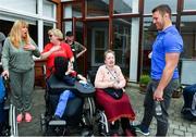 12 April 2019; MS Ireland are a charity partner of Leinster Rugby and as part of their partnership they will have a match day take-over at the RDS Arena tomorrow. Ahead of the game Leo Cullen and Seán O’Brien visited staff and patients at the MS Ireland Care Centre in Dublin. Pictured is Sean O'Brien with residents. Photo by Ramsey Cardy/Sportsfile