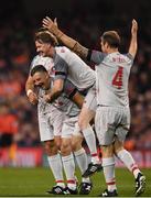 12 April 2019; John Aldridge of Liverpool FC Legends, left, celebrates after scoring their side’s first goal with Steve McManaman and Jason McAteer during the Sean Cox Fundraiser match between the Republic of Ireland XI and Liverpool FC Legends at the Aviva Stadium in Dublin. Photo by Sam Barnes/Sportsfile