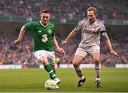 12 April 2019; Robbie Keane of Republic of Ireland XI in action against Jason McAteer of Liverpool FC Legends during the Sean Cox Fundraiser match between the Republic of Ireland XI and Liverpool FC Legends at the Aviva Stadium in Dublin. Photo by Stephen McCarthy/Sportsfile