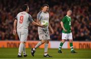 12 April 2019; John Aldridge of Liverpool FC Legends takes the ball from Robbie Fowler of Liverpool FC Legends as he steps up to take a penalty during the Sean Cox Fundraiser match between the Republic of Ireland XI and Liverpool FC Legends at the Aviva Stadium in Dublin. Photo by Sam Barnes/Sportsfile
