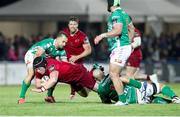 12 April 2019; Ciaran Parker of Munster  is tackled by Marco Lazzaroni of Benetton Treviso during the Guinness PRO14 Round 20 game between Benetton Treviso and Munster Rugby at Stadio di Monigo in Treviso, Italy. Photo by Roberto Bregani/Sportsfile