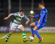 12 April 2019; Joel Coustrain of Shamrock Rovers in action against Zak Elbouzedi of Waterford during the SSE Airtricity League Premier Division match between Shamrock Rovers and Waterford at Tallaght Stadium in Dublin. Photo by Ramsey Cardy/Sportsfile