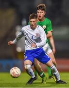 12 April 2019; Carter Lycett of England in action against Jake Ellis of Republic of Ireland during the SAFIB Centenary Shield Under 18 Boys' International match between Republic of Ireland and England at Dalymount Park in Dublin. Photo by Ben McShane/Sportsfile
