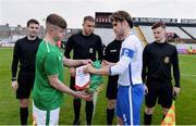 12 April 2019; Team captains, Niall O'Keeffe of Republic of Ireland, left, and Levi Tarbotton of England trade pennants prior to the SAFIB Centenary Shield Under 18 BoysÕ International match between Republic of Ireland and England at Dalymount Park in Dublin. Photo by Ben McShane/Sportsfile