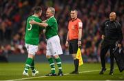 12 April 2019; Ray Houghton comes on to replace his Republic of Ireland XI team-mate Ian Harte during the Sean Cox Fundraiser match between the Republic of Ireland XI and Liverpool FC Legends at the Aviva Stadium in Dublin. Photo by Stephen McCarthy/Sportsfile