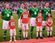12 April 2019; Republic of Ireland XI players and mascots prior to the Sean Cox Fundraiser match between the Republic of Ireland XI and Liverpool FC Legends at the Aviva Stadium in Dublin. Photo by Stephen McCarthy/Sportsfile