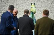 13 April 2019; Racegoers look at horse sculptures prior to racing at Naas Racecourse in Naas, Co Kildare. Photo by David Fitzgerald/Sportsfile