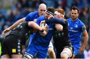 13 April 2019; Caelan Doris of Leinster is tackled by Zander Fagerson, left, and Rob Harley of Glasgow Warriors during the Guinness PRO14 Round 20 match between Leinster and Glasgow Warriors at the RDS Arena in Dublin. Photo by Ramsey Cardy/Sportsfile