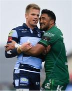 13 April 2019; Bundee Aki of Connacht and Gareth Anscombe of Cardiff Blues embrace as they wait for referee Mike Adamson to award a try to Matt Healy of Connacht during the Guinness PRO14 Round 20 match between Connacht and Cardiff Blues at The Sportsground in Galway. Photo by Piaras Ó Mídheach/Sportsfile